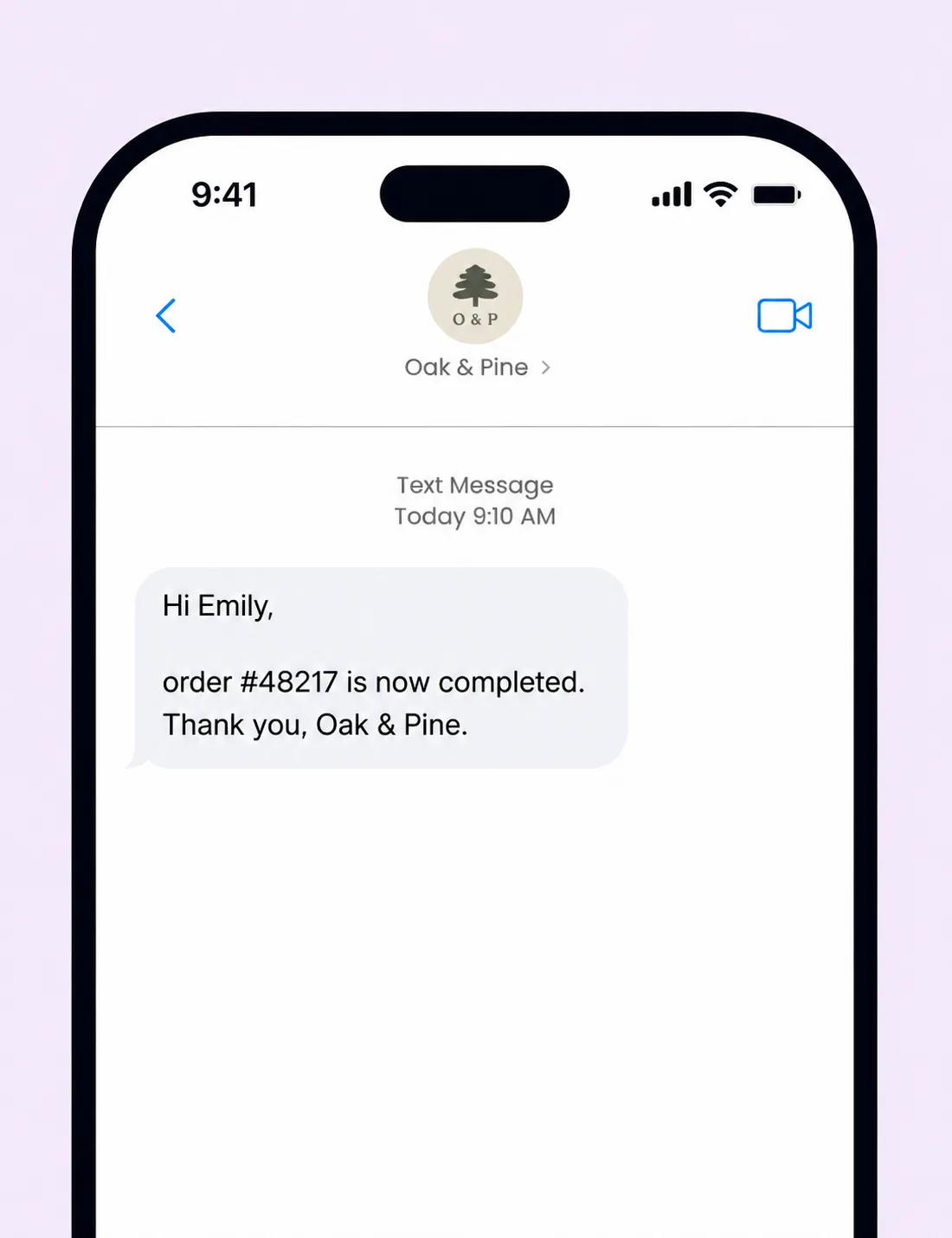 Example smartphone text message showing a Texty SMS notification telling a customer their WooCommerce order has been completed